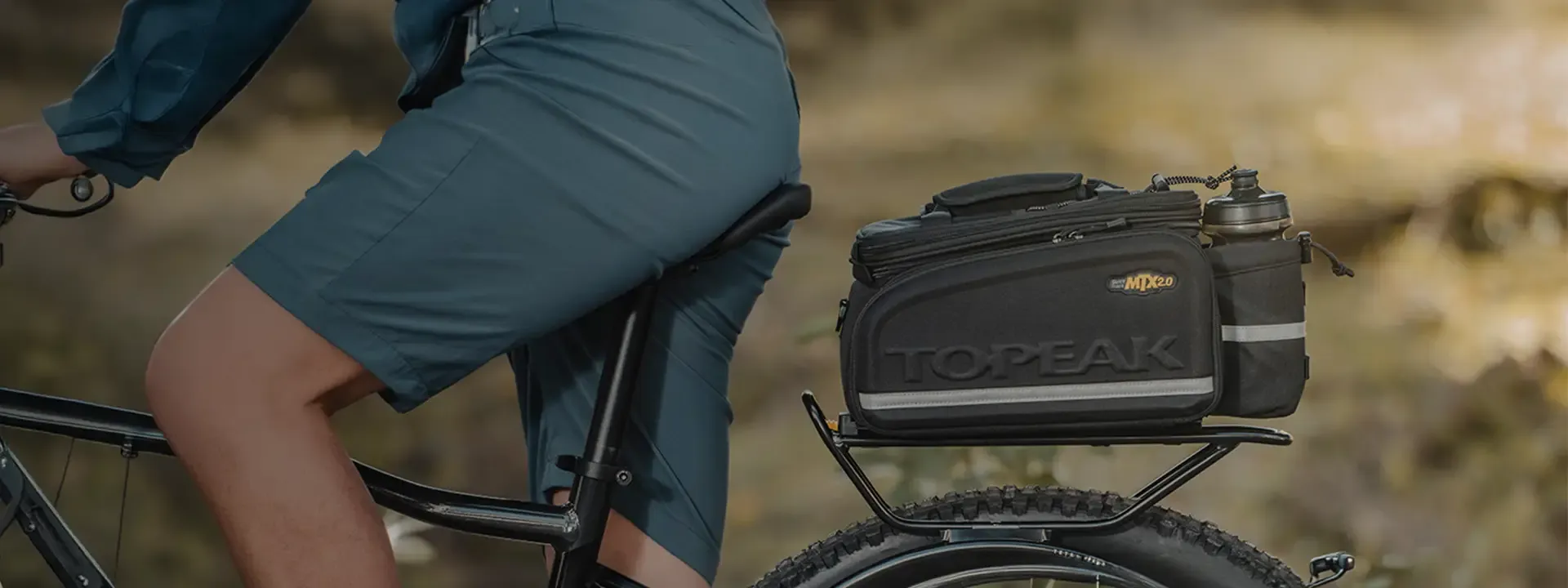 Topeak MTX rack bag mounted above the rear wheel of a bike