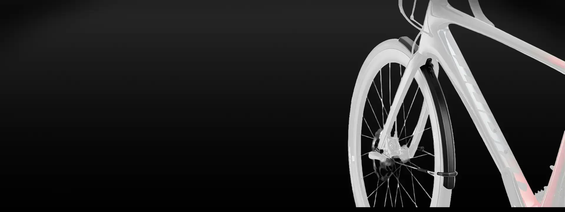 Giant bike fitted with a front mudguard against a dark background