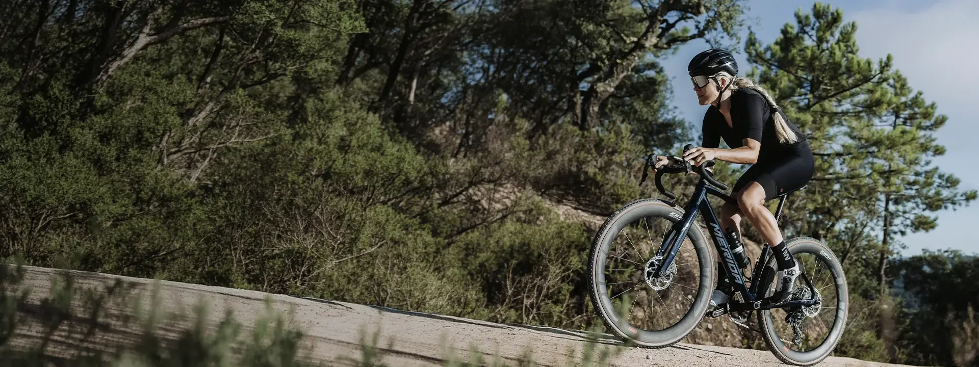 Gravel cyclist riding in lightweight Lycra cycling shorts during warm weather riding conditions