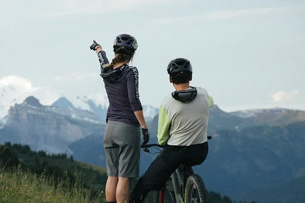 Male and female mtb riders wearing Upper body mountain bike clothing