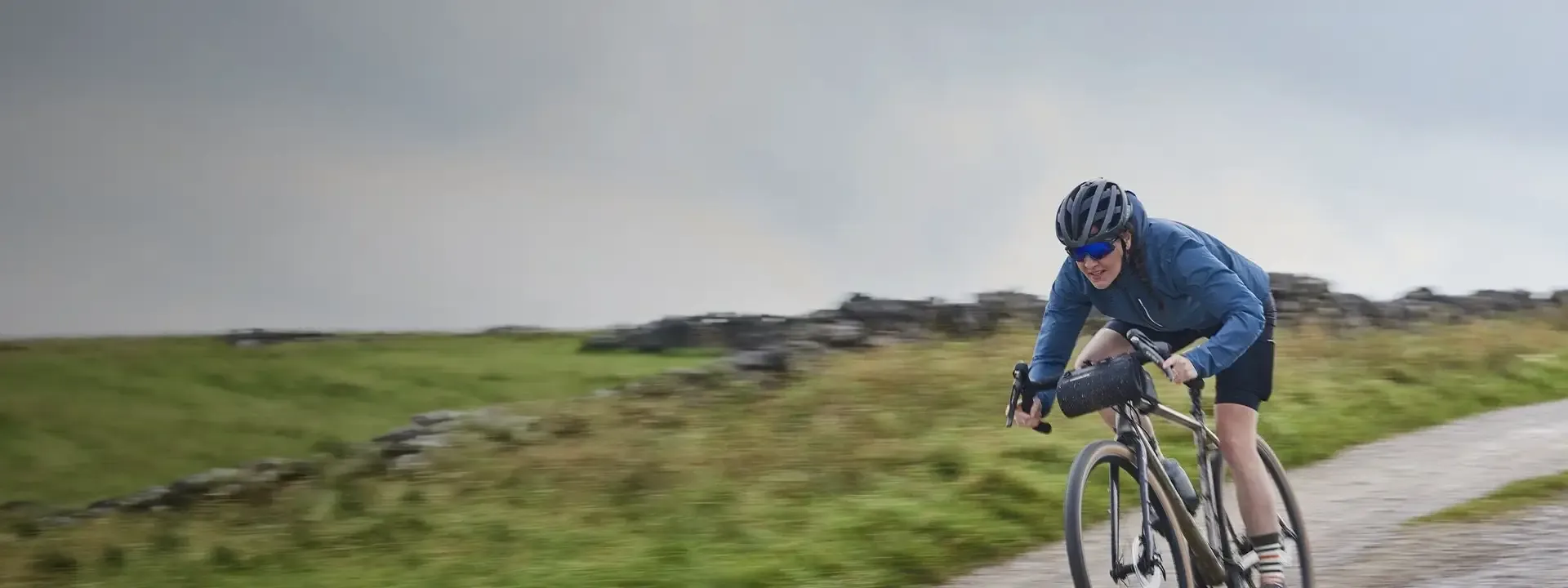 Cyclists wearing windproof cycling jackets for road, gravel and mountain bike riding in cool weather conditions