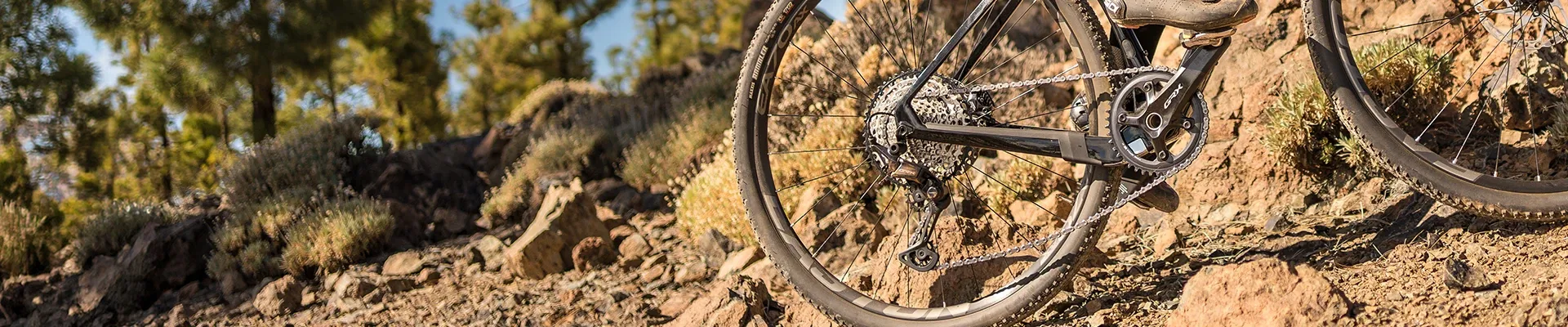 Shimano GRX drivetrain detail oon Merida SIlex riding on rocky terrain