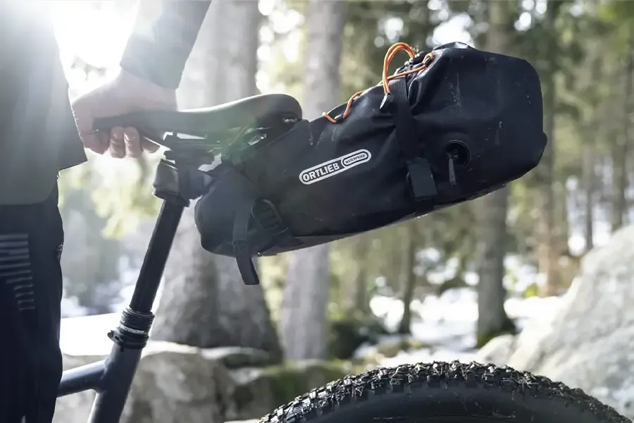 Large bikepacking saddle bag fitted beneath an MTB saddle
