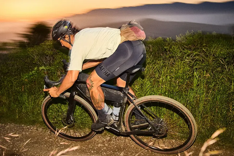Gravel rider wearing a waist pack worn around the hips