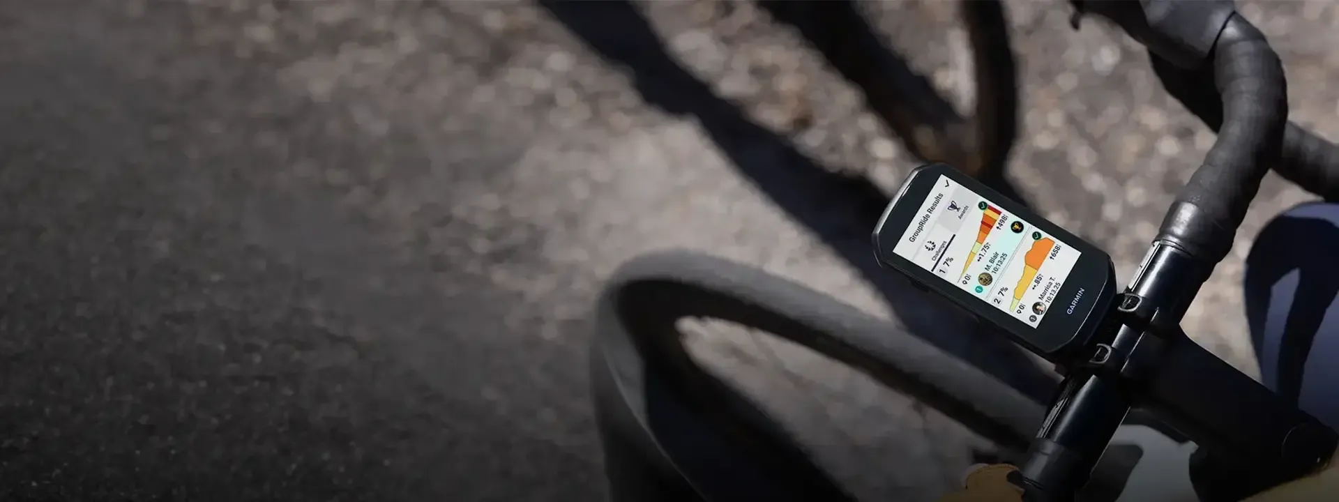 GPS bike computer displaying ride data on a road bike handlebar