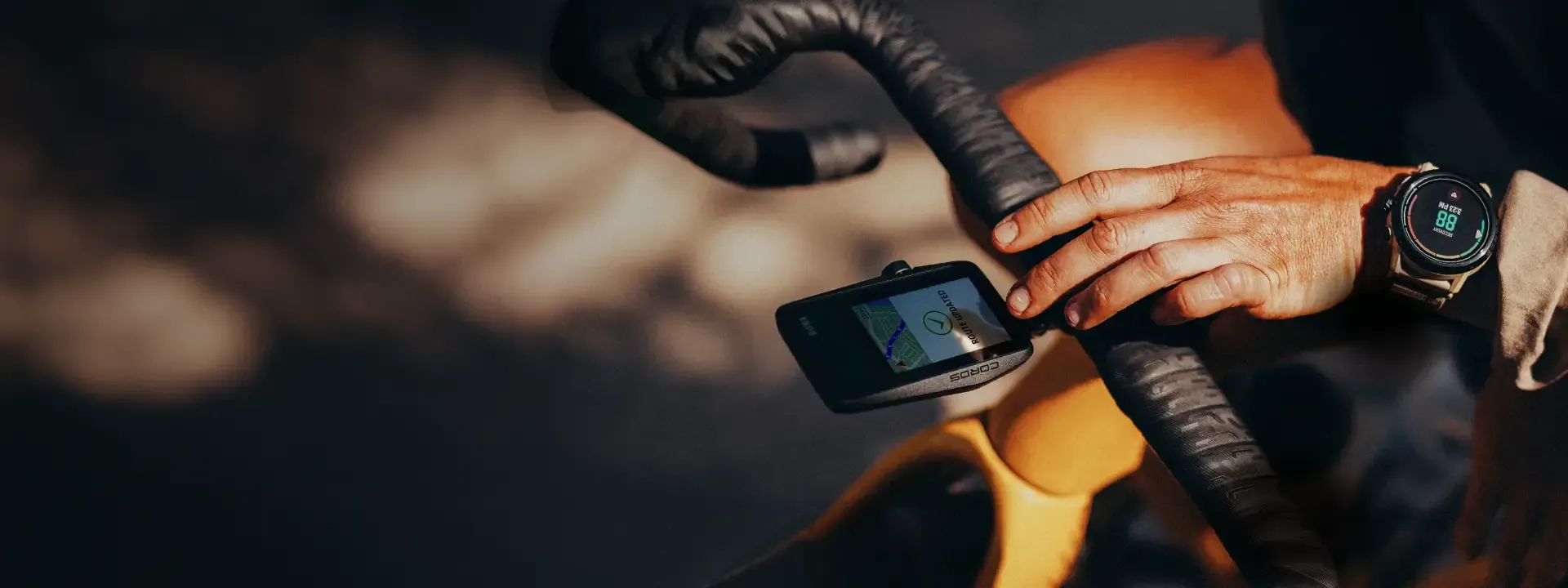 Using cycling technology including computer adn sports watch on a road bike - detail