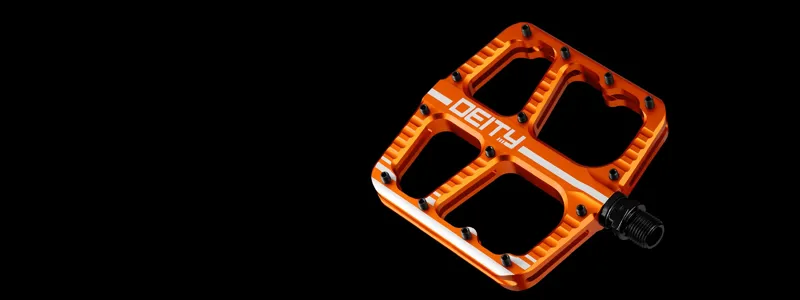 Deity flat MTB pedals on a mountain bike