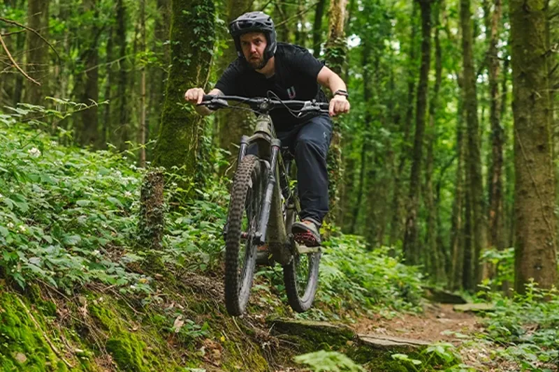 Electric mountain bike riding in the woods