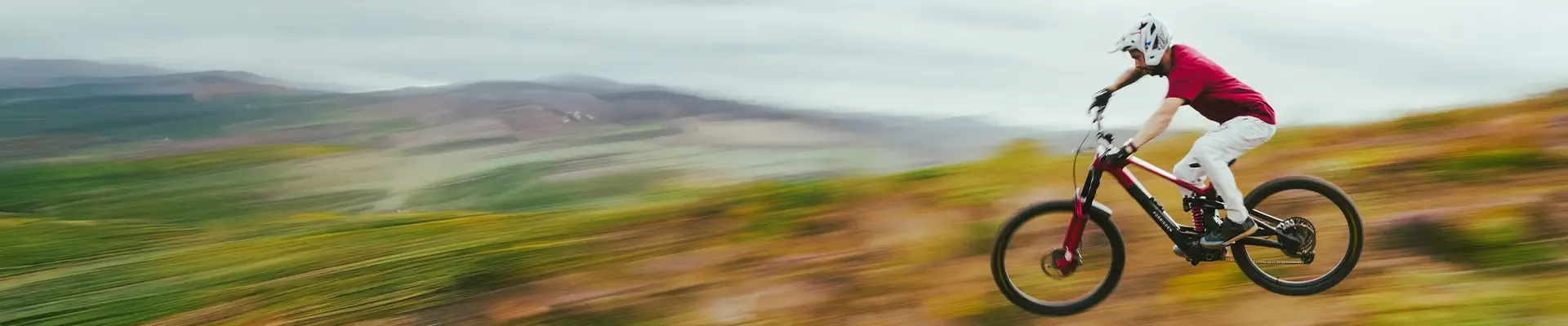 Mike Jones riding the Forbidden Dreadnought E eMTB on a fast open MTB track
