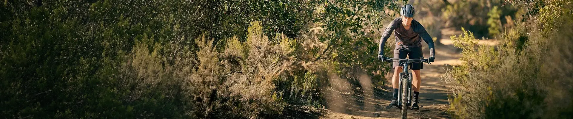 Giant hardtail electric mountain bike riding on a trail