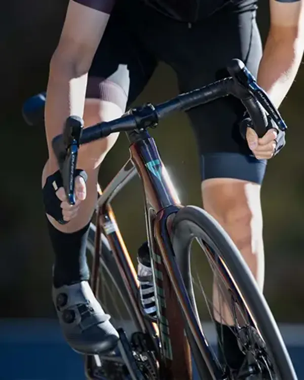 Riding the Giant TCR Advanced race bike front on detail