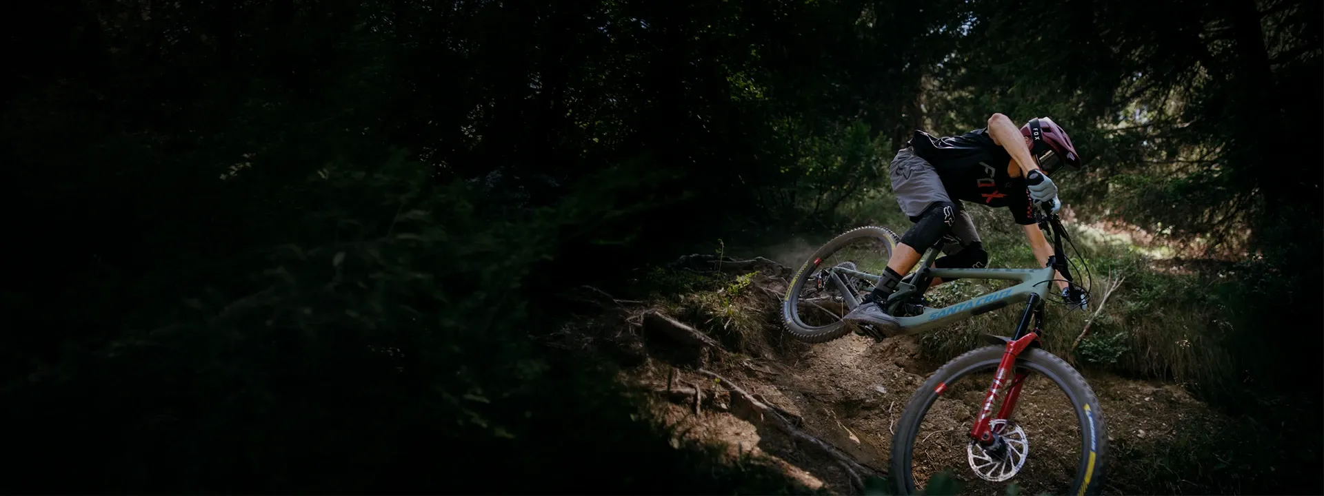 Mountain biker wearing full-finger gloves on a trail ride