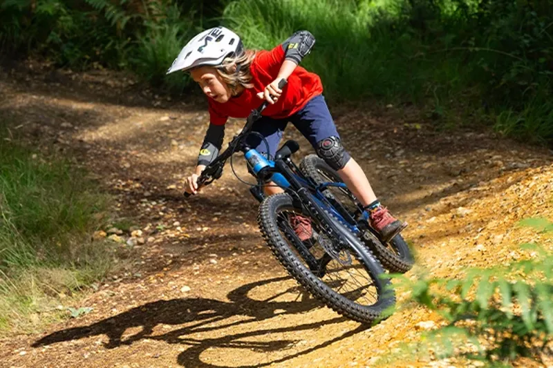 Child riding confidently on a lightweight Marin San Quentin Jr kids mountain bike