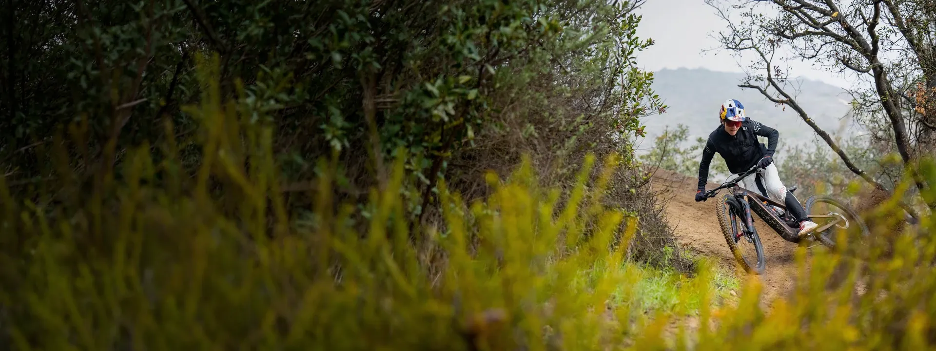Mountain biker wearing an MTB gilet on a cool trail ride