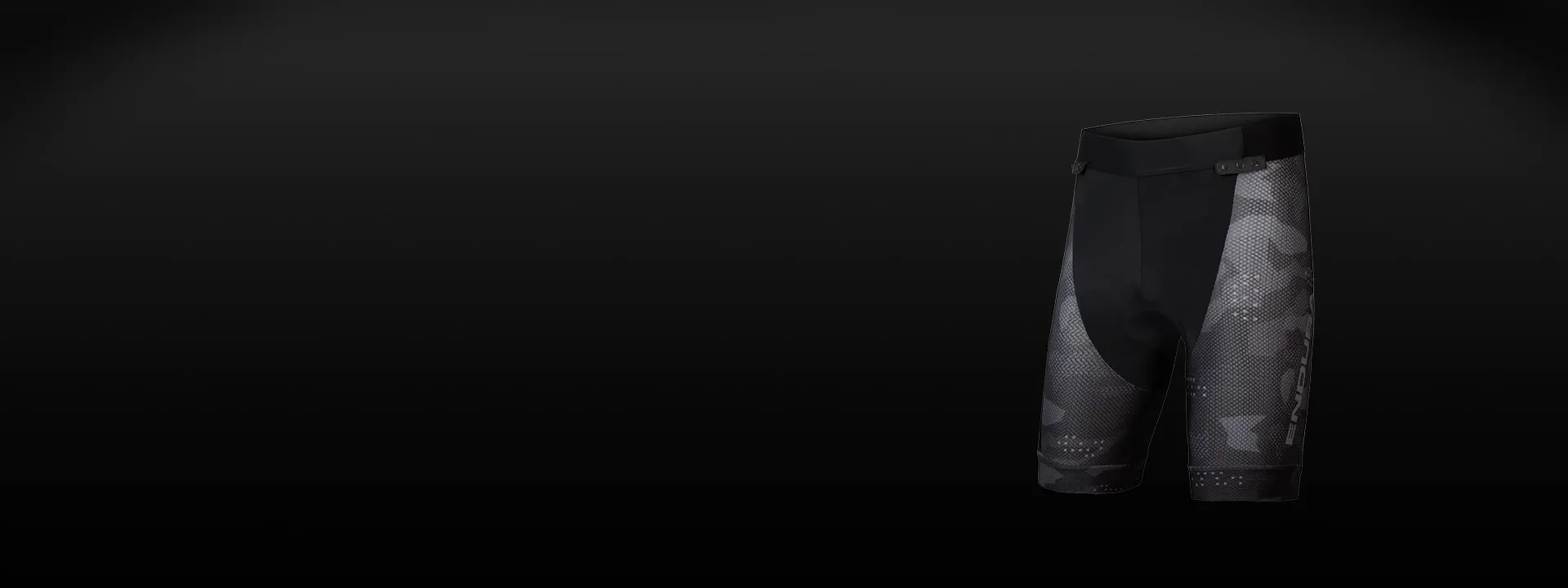 Mountain biker wearing padded undershorts under baggy shorts on a trail ride