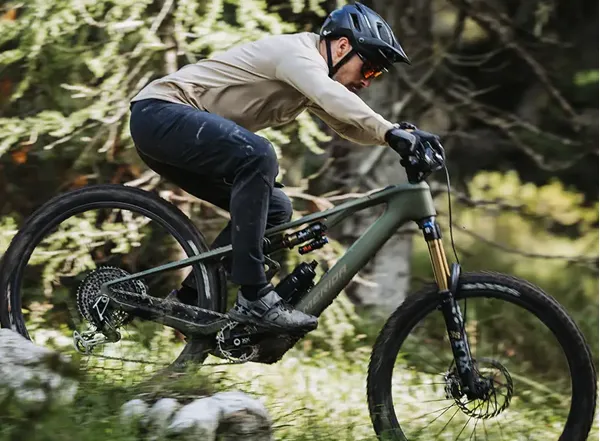 Mountain biker riding in MTB trousers