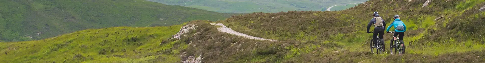 Mountain bikers riding in MTB shorts and trousers