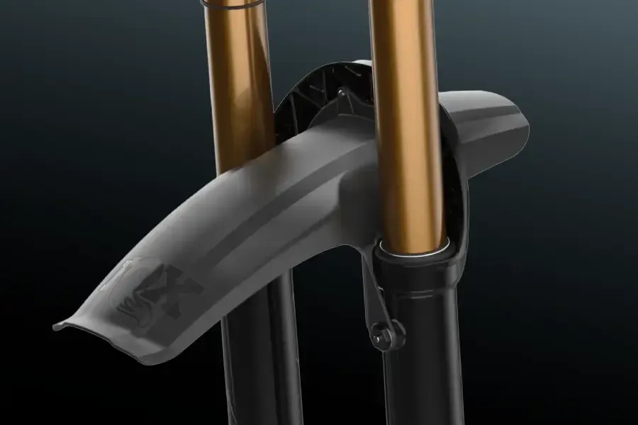 Black FOX mudguard fitted to an orange FOX suspension fork