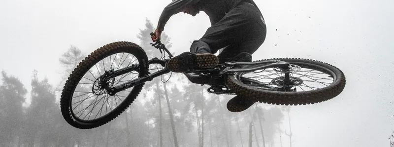 Riding an Amflow ebike, detail showing motor and pedals