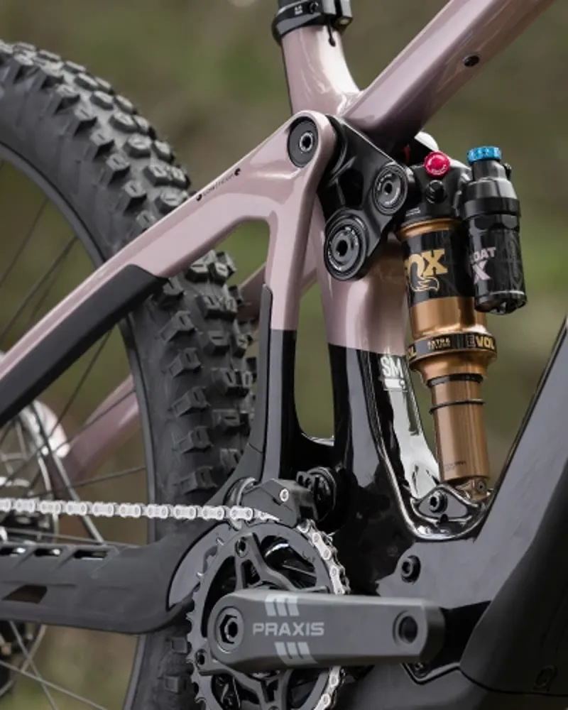 Close-up of Pivot Shuttle AMP&rsquo;d dw-link rear suspension with Fox Float X shock and linkage detail.