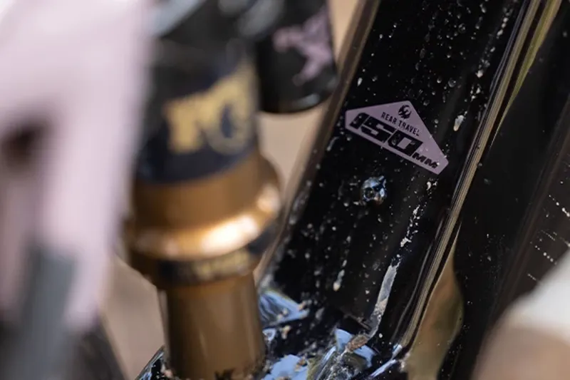 Pivot Shuttle AMP'd frame and shock detail showing 150mm travel decal