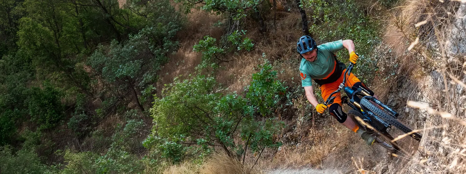 Mountain biker wearing Endura body armour on a trail ride