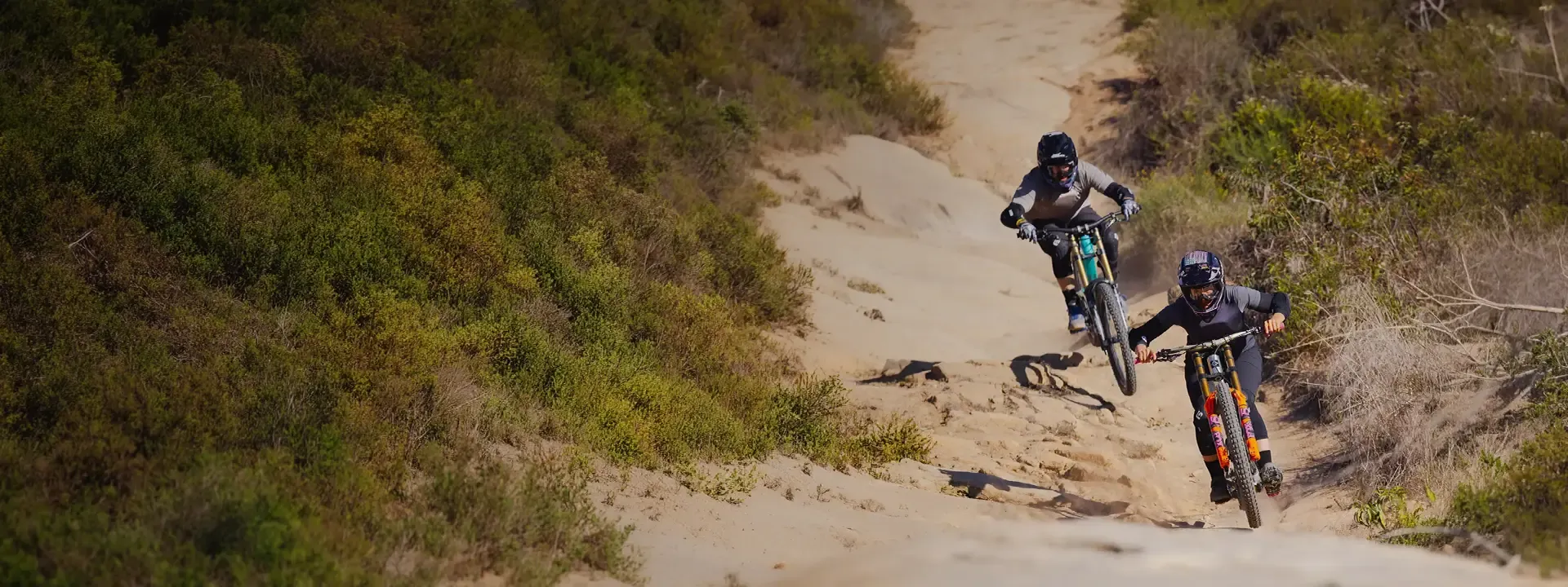 Mountain biker wearing torso protection on a technical trail