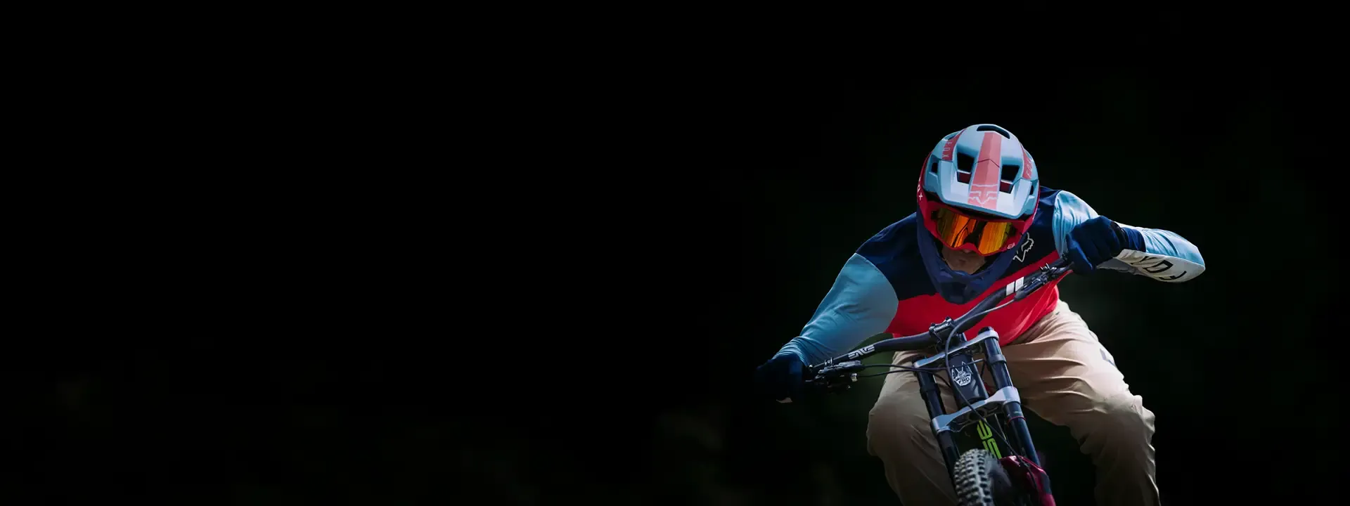 Mountain biker wearing MTB goggles on a technical trail