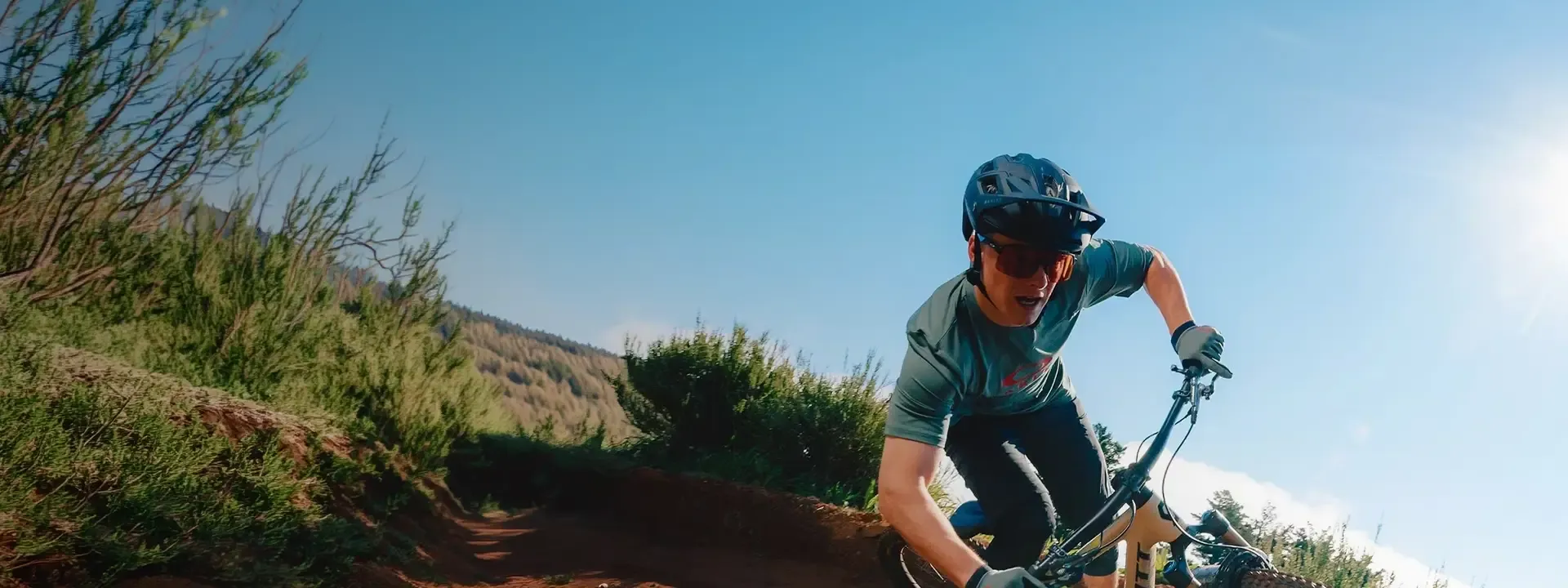 Cyclist wearing Oakley eyewear on road and mountain bike rides