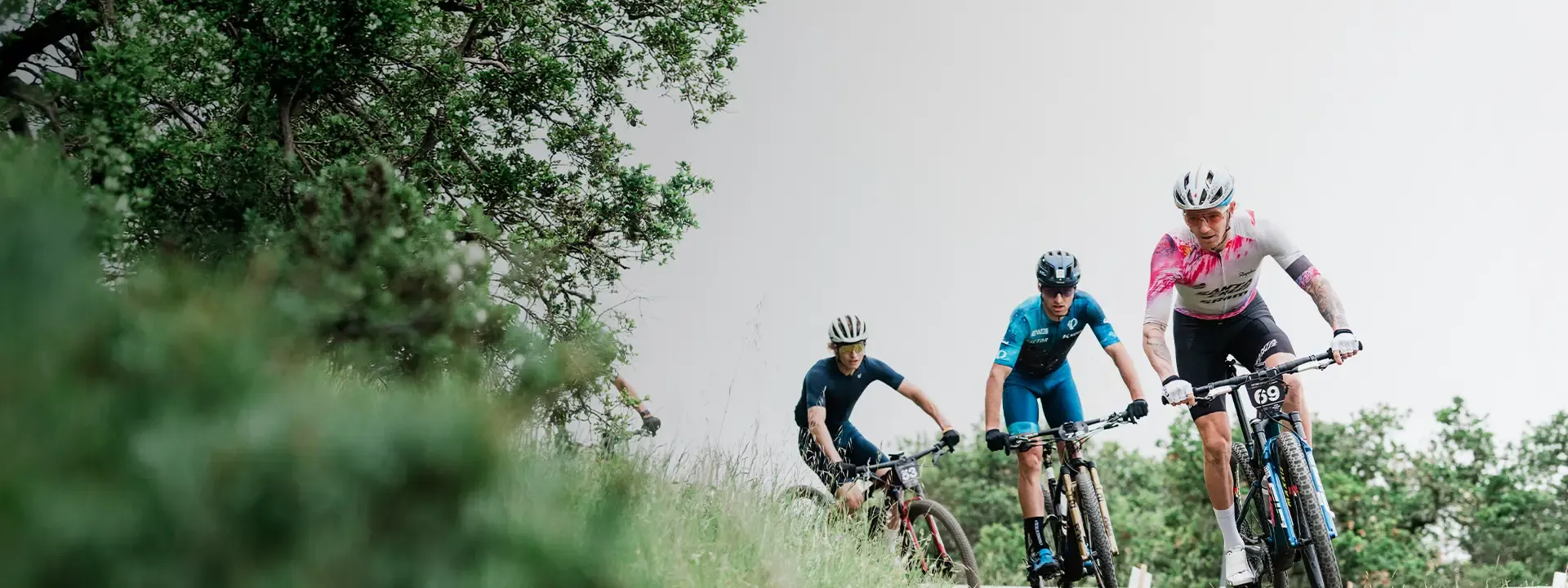 Cyclist wearing protective eyewear while riding outdoors