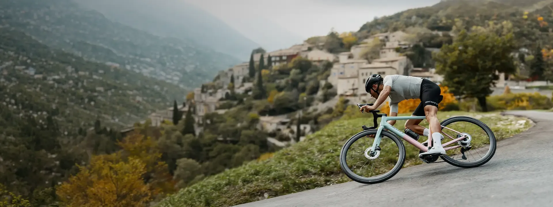 Male road cyclists wearing performance road bike clothing during a road ride