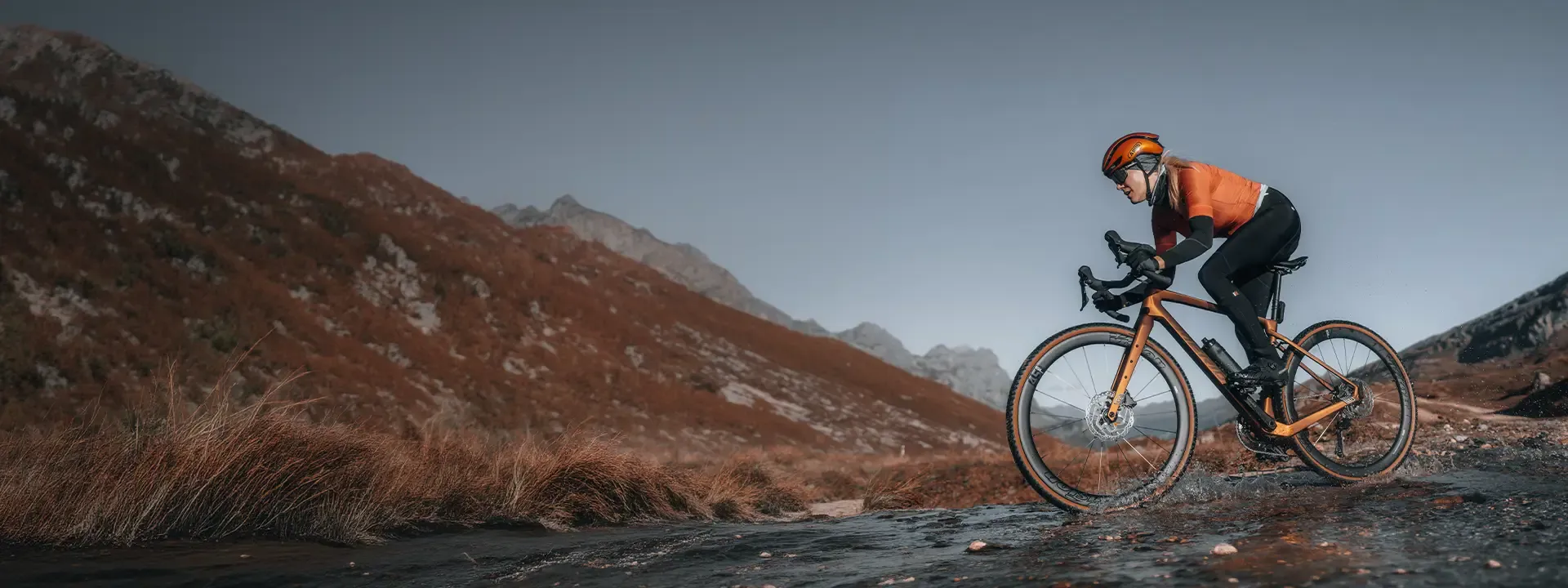Road cyclist wearing thermal cycling tights during winter road riding