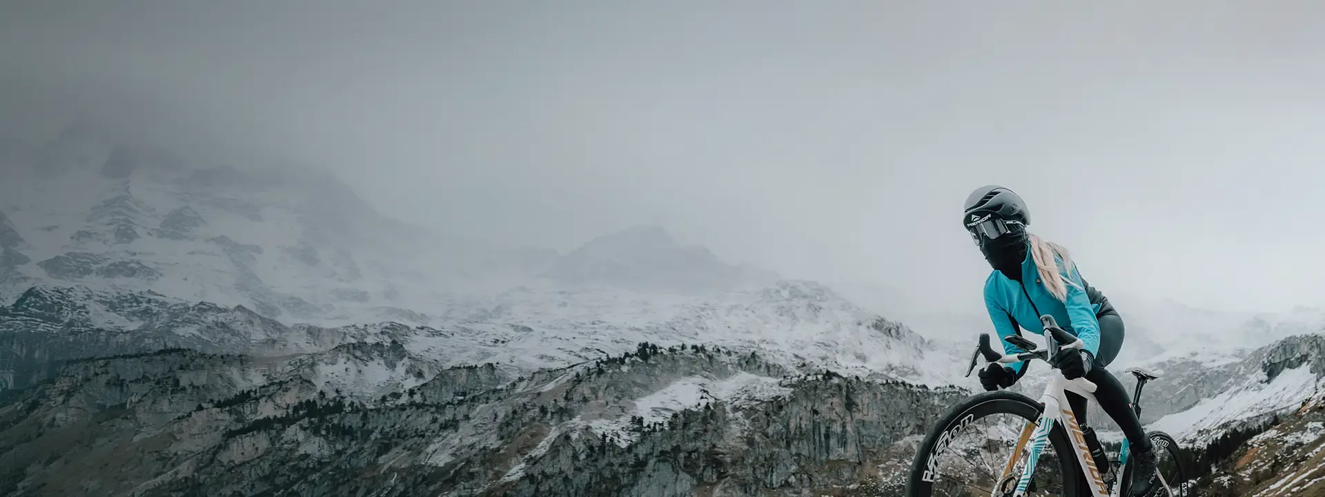 Road cyclists wearing arm warmers and cold weather accessories during a cool road ride