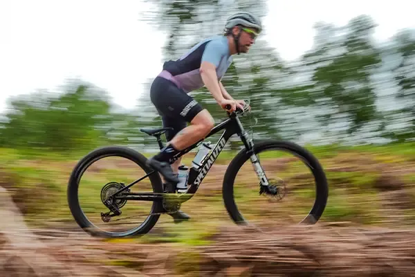 Sprinting on single track on the Specialized Epic 9 with its lightweight carbon frame