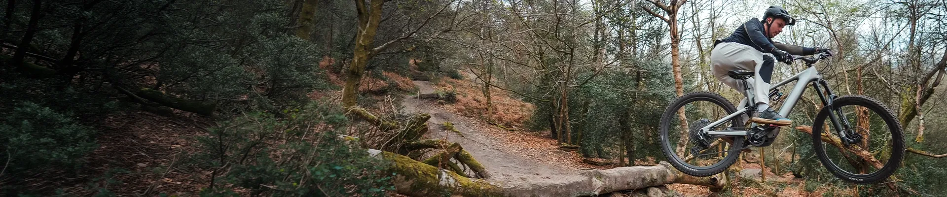 Specialized Levo Evo electric mountain bike riding downhill jump