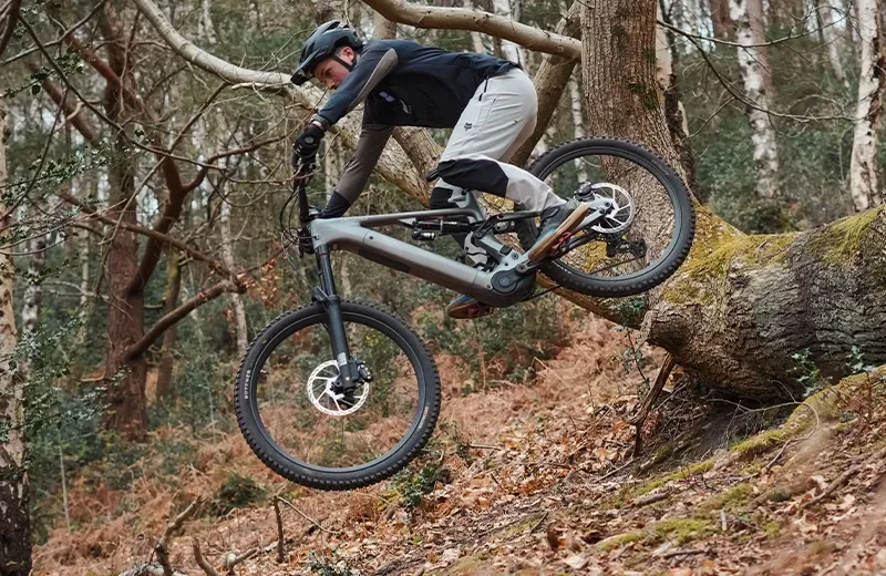 Specialized Levo Evo on steep drop in woods