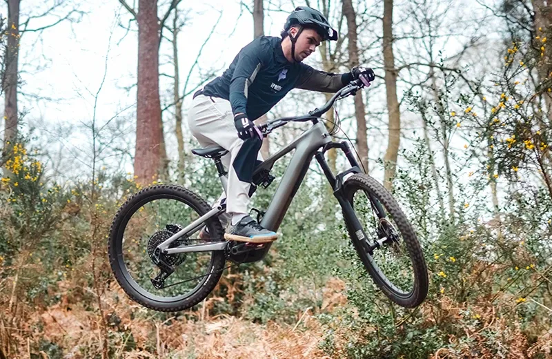 Specialized Levo Evo jump in woods