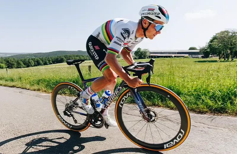 Remco Evenepoel making an out-of-the-saddle effort on a Specialized Tarmac race bike