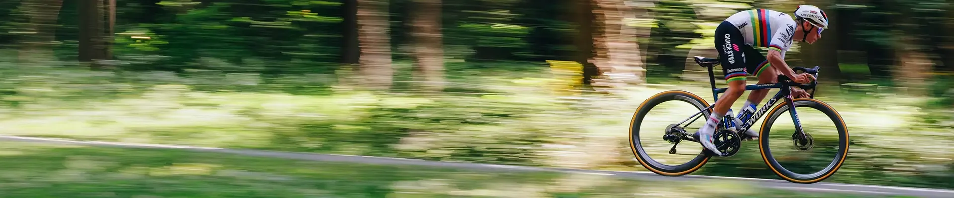 Remco Evenopoel riding the Specialized Tarmac SL8 road bike, pan shot