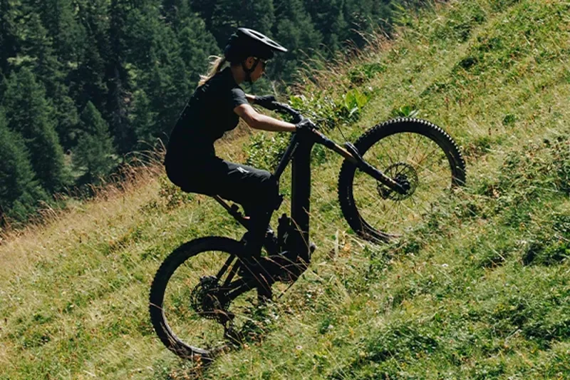 Specialized Turbo Levo full-power e-MTB climbing a steep trail