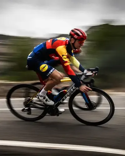 Two riders descending together on Trek Madone road bikes