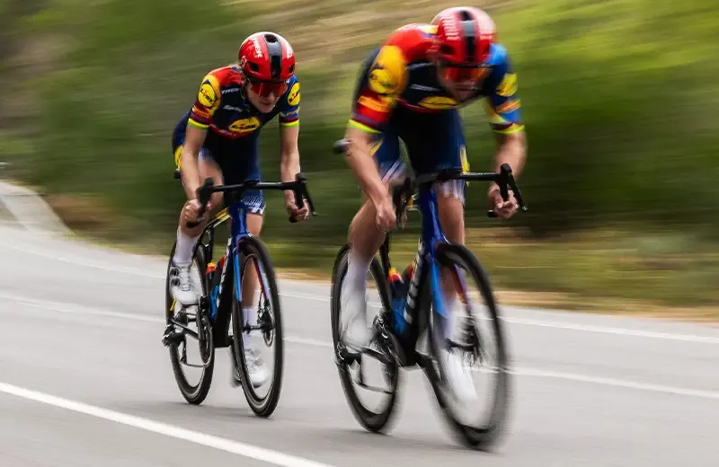 Two road riders pushing the pace together on Trek Madone bikes