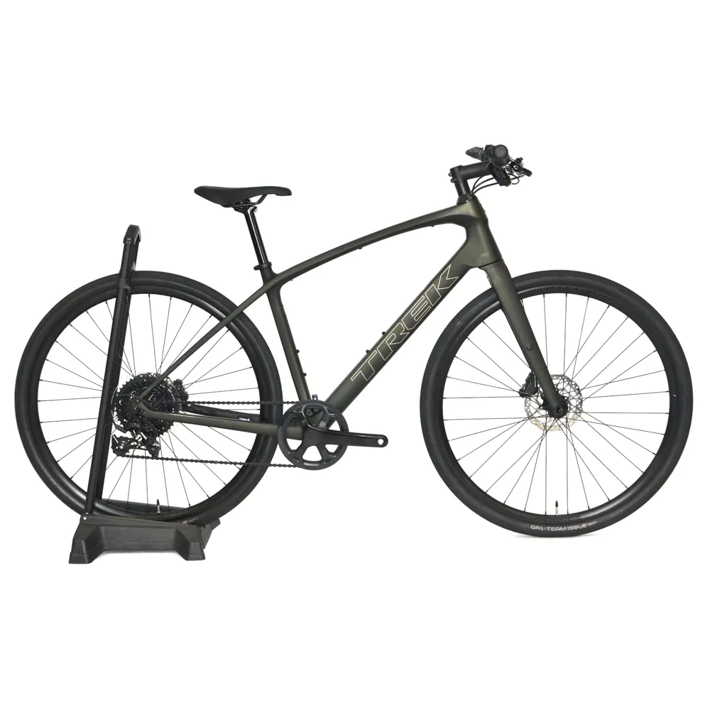 uPRISE Bikes Ex Demo Trek FX Sport 5 2026 Carbon Hybrid Bike - Medium - Black Olive/Deep Smoke | Price match, 365 day returns, 18-Month Warranty, Finance Available & Free UK Delivery