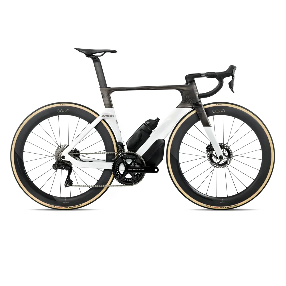 uPRISE Bikes Orbea Orca Aero M10i Ltd 2026 Carbon Aero Road Bike - Magic Gold/Carbon Raw | Price match, 365 day return s, 18-Month Warranty, Finance Available & Free UK Delivery