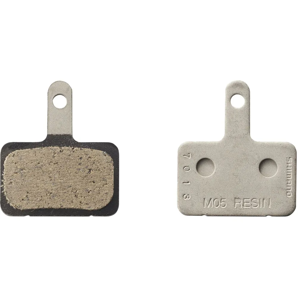 uPRISE Bikes Shimano M05-RX Resin Pad Steel Back Disc Pads + Spring | Price match, 365 day return s, 18-Month Warranty, Finance Available & Free UK Delivery